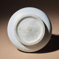 A Chinese White Glazed Molded Porcelain 'Floral' Jar, Mid Ming Dynasty, 15th Century — 明中期 白釉模印纏枝花卉敞口罐