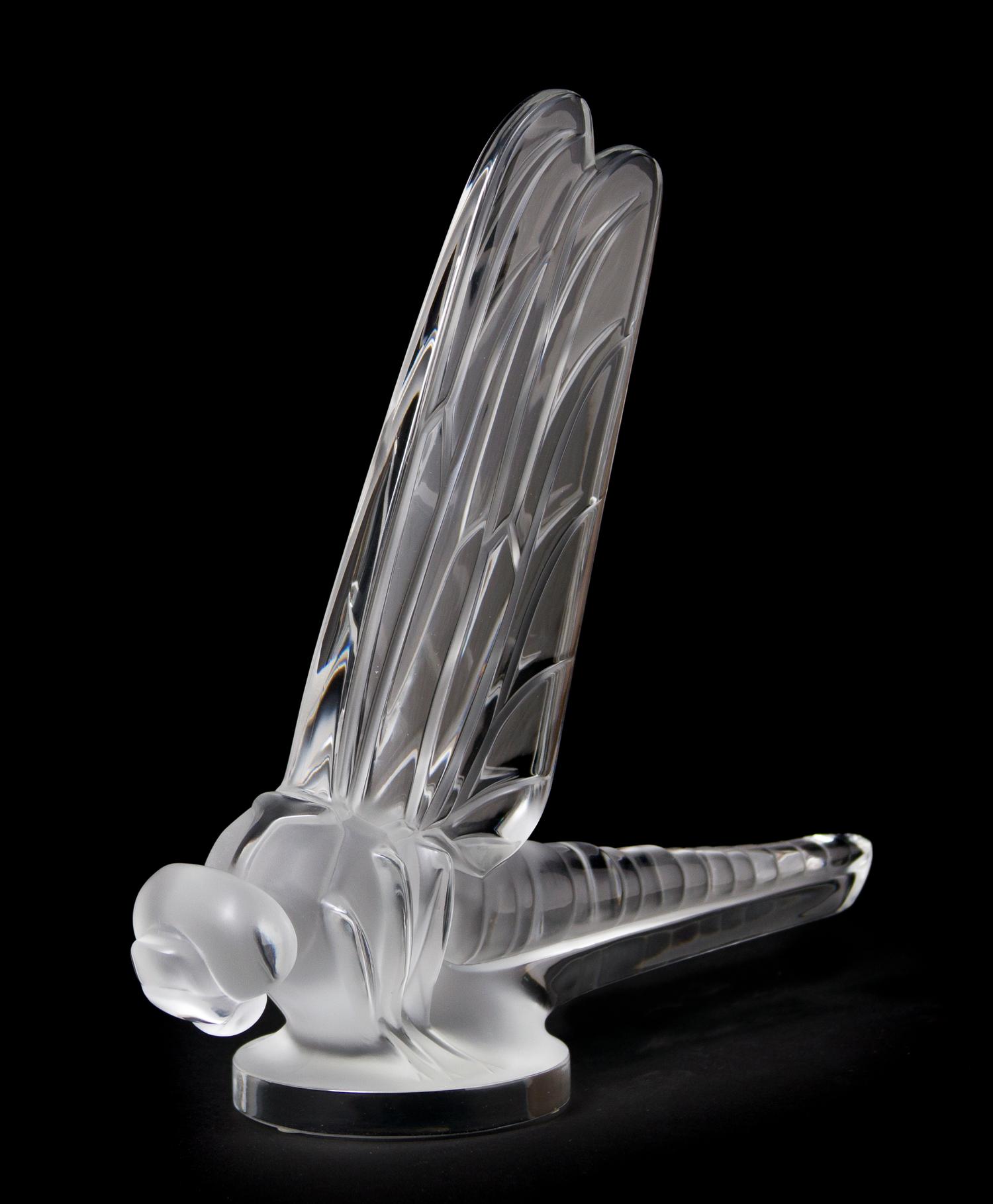 A Lalique Molded and Frosted Glass Radiator Cap, Height 8 inches.