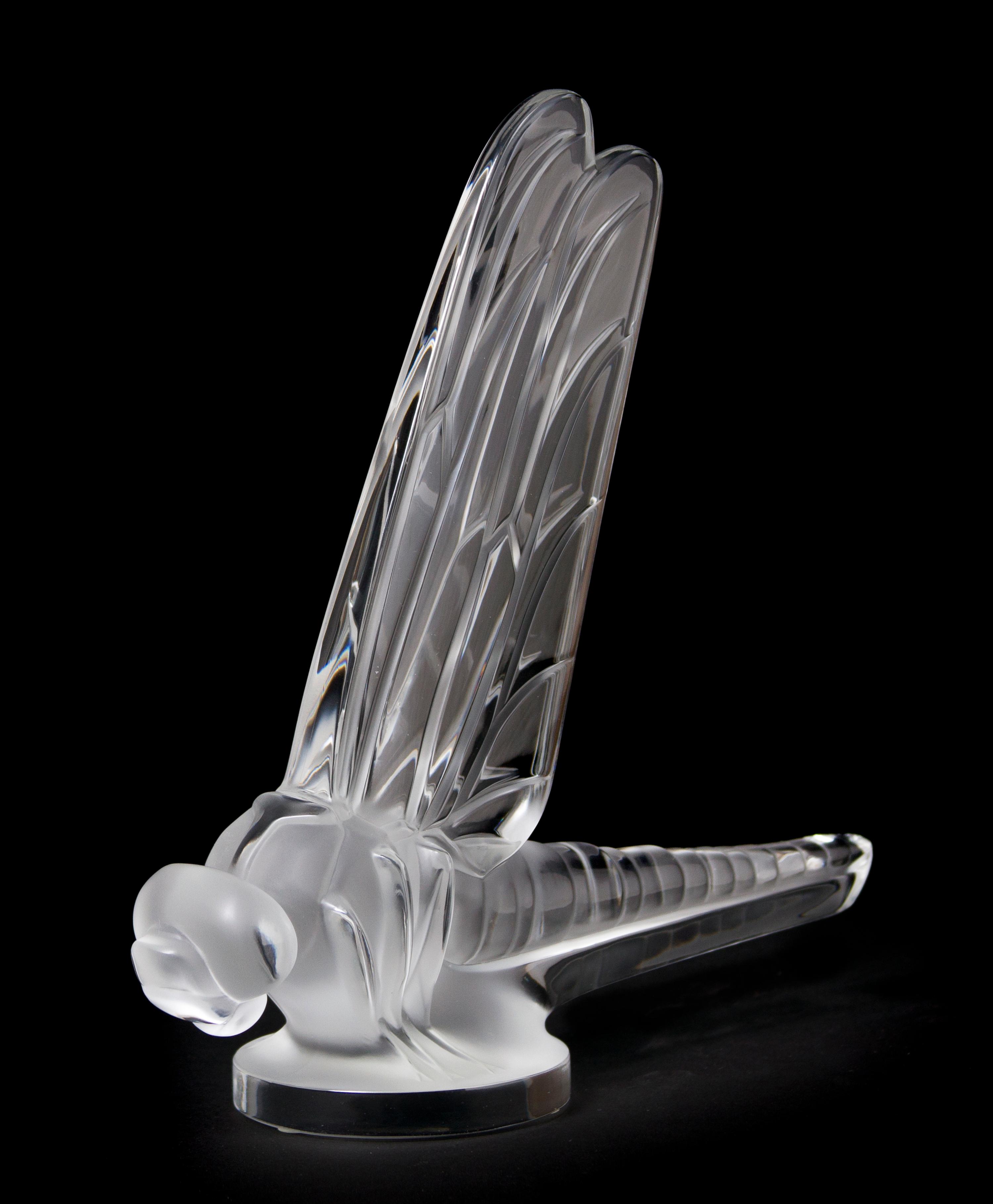 A Lalique Molded and Frosted Glass Radiator Cap, Height 8 inches.