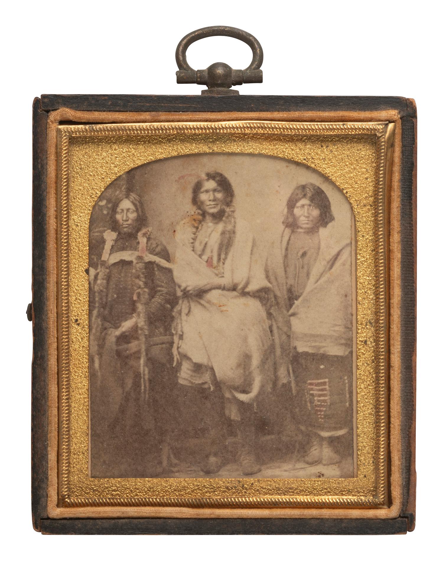 [NATIVE AMERICANS]. MCKENNY, A.S., photographer. CDV of Ute Indians in a studio setting. Blackhawk, Colorado Territory. Ca 1870.