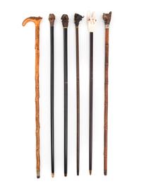 A Group of Six Zoomorphic Carved Wood Walking Sticks