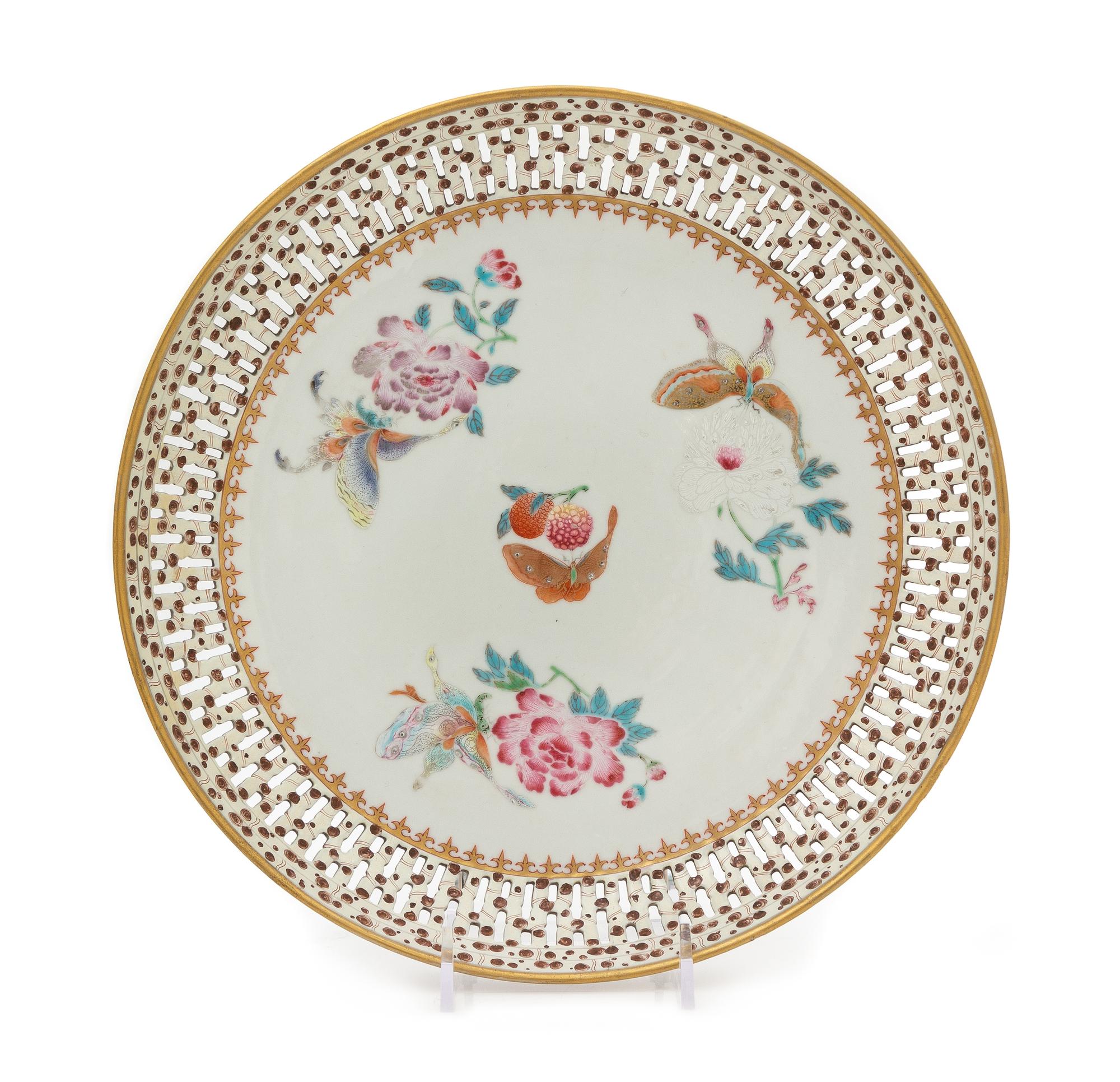 A Chinese Export Famille Rose Reticulated Porcelain Plate Diameter 9 7/8 inches. — CIRCA 1780