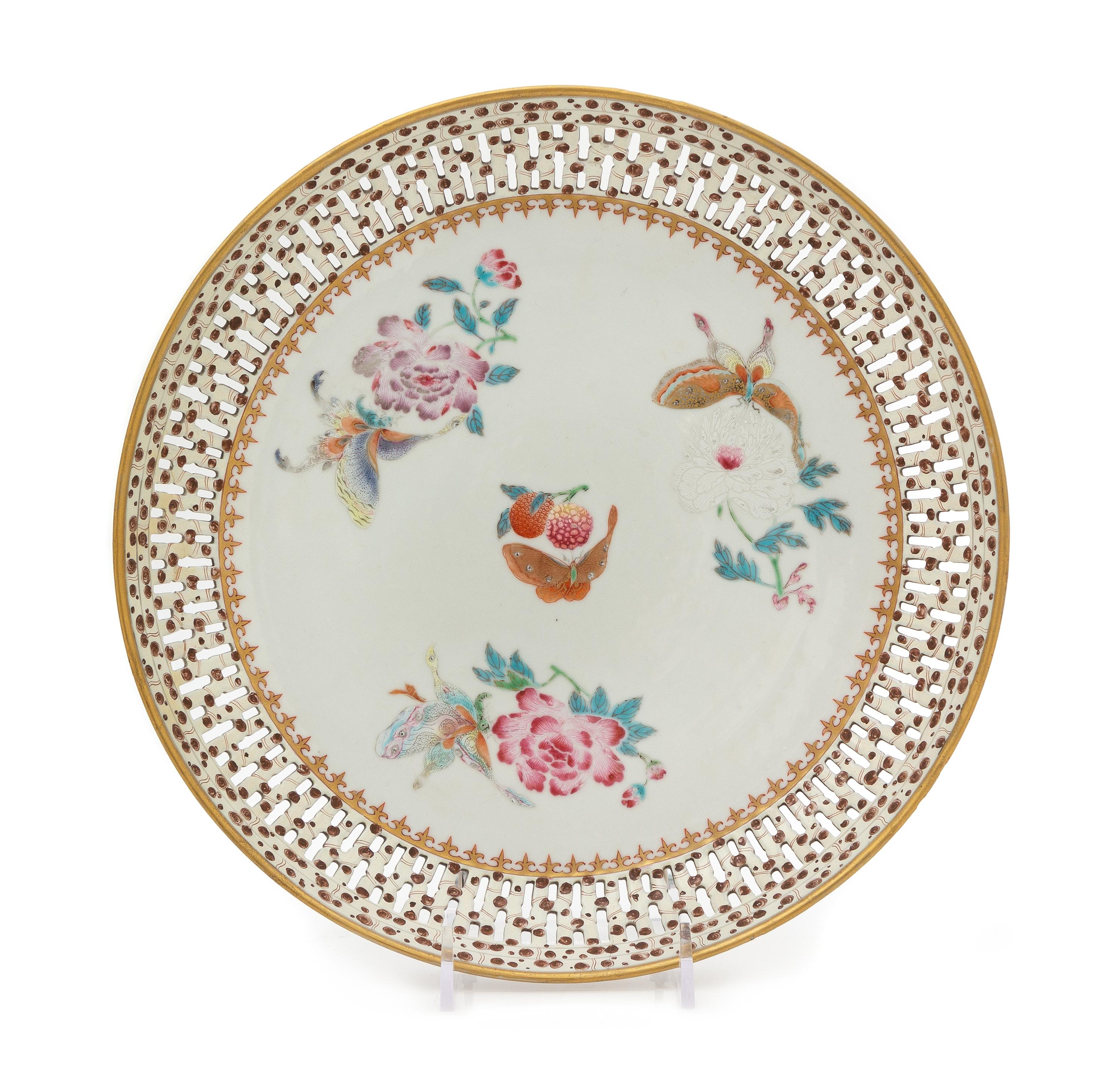 A Chinese Export Famille Rose Reticulated Porcelain Plate Diameter 9 7/8 inches. — CIRCA 1780