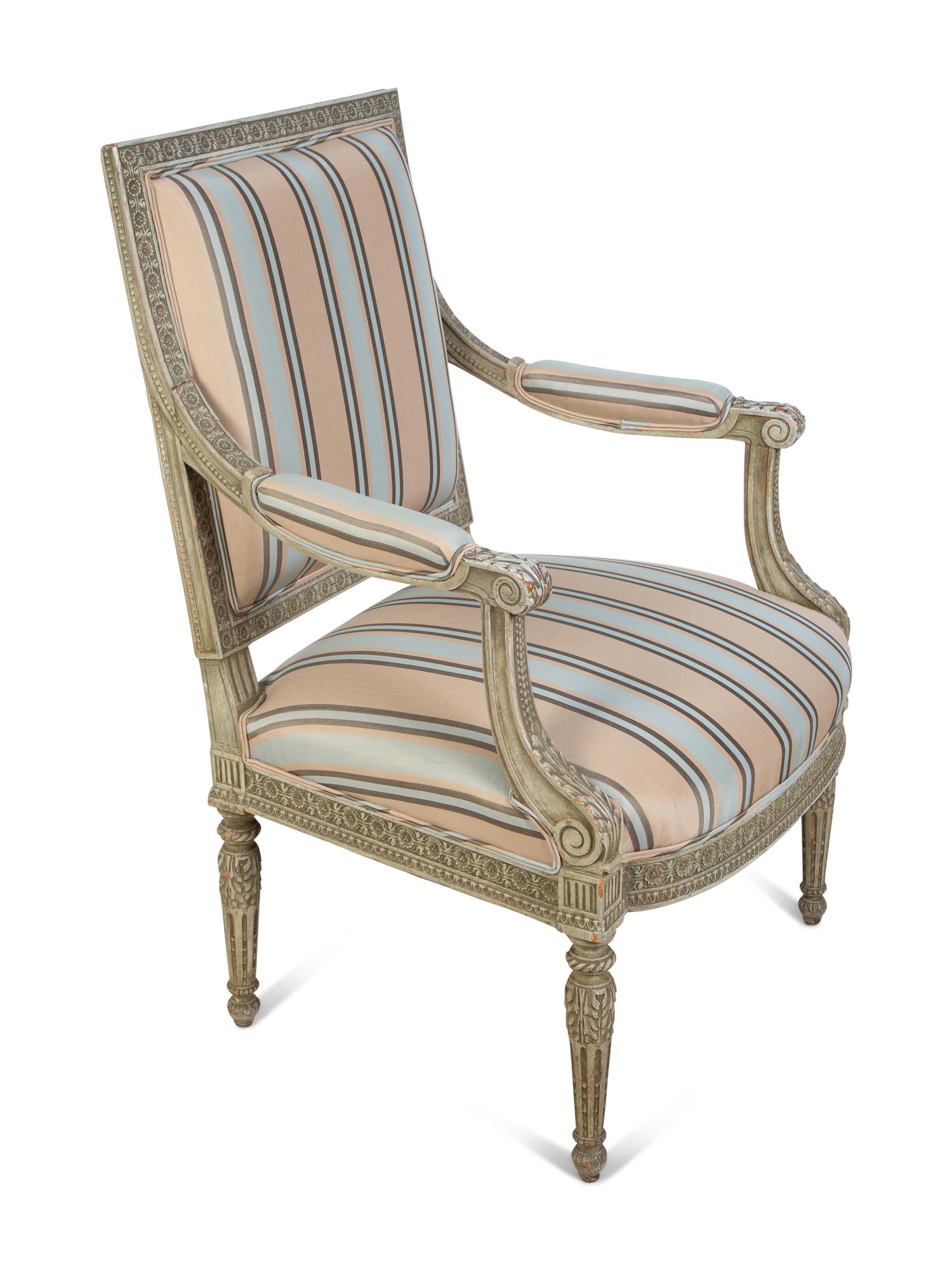 A Louis XVI Style Carved and Painted Fauteuil — 19TH CENTURY