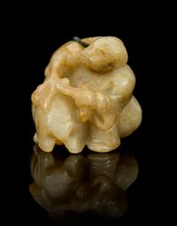 A Carved Jade Toggle Height 1 1/8 inches.
