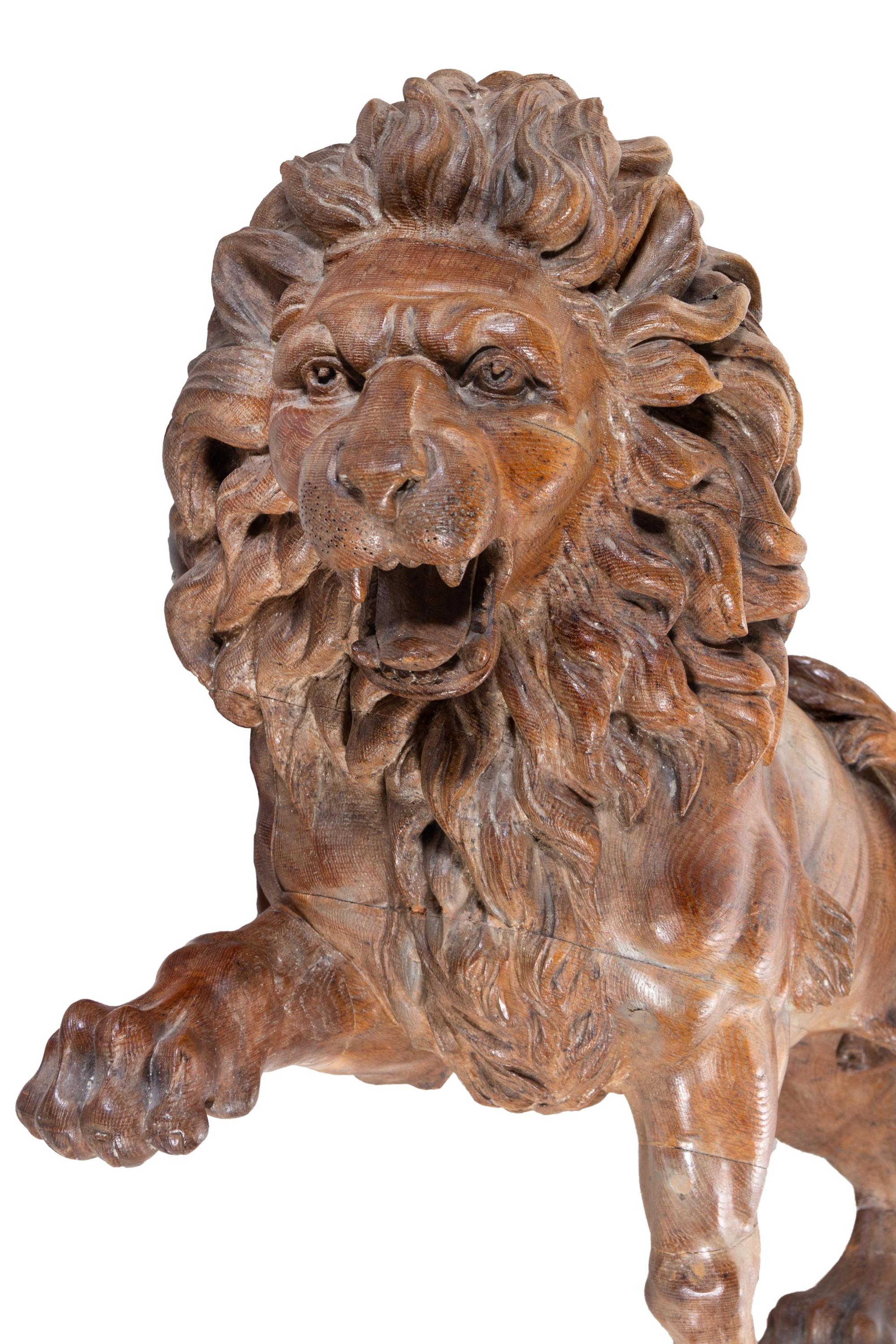 A Pair of English Limed Oak Models of Lions
