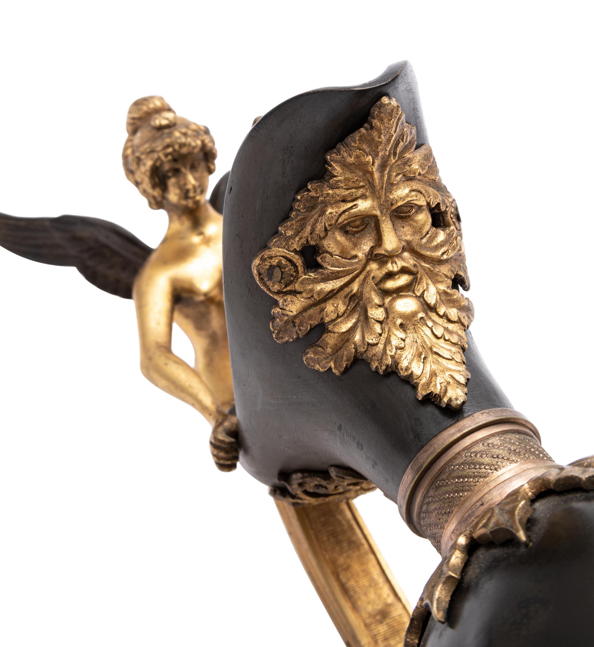 A Pair of Continental Gilt and Patinated Bronze Ewers