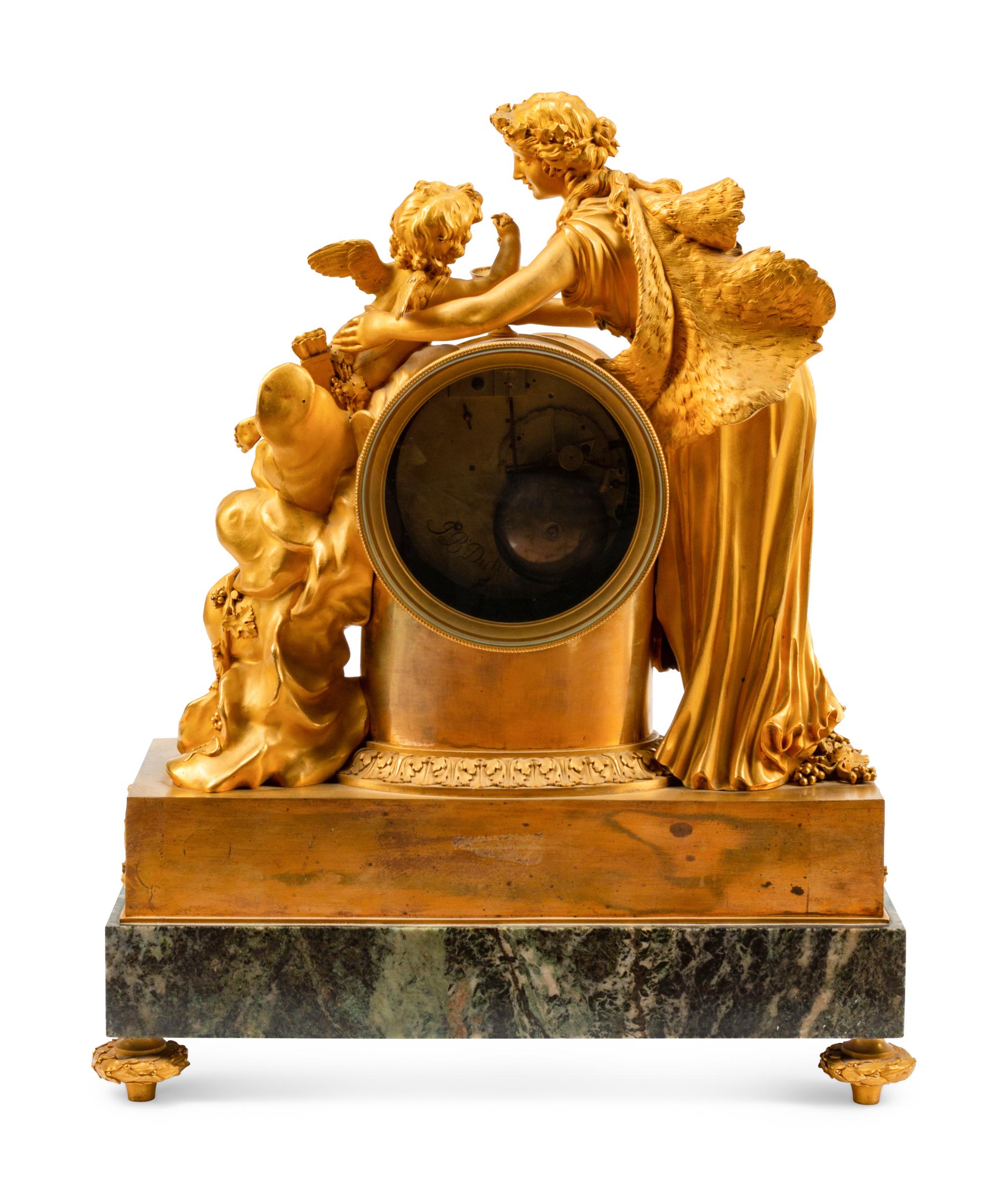 A French Gilt Bronze and Marble Mantel Clock