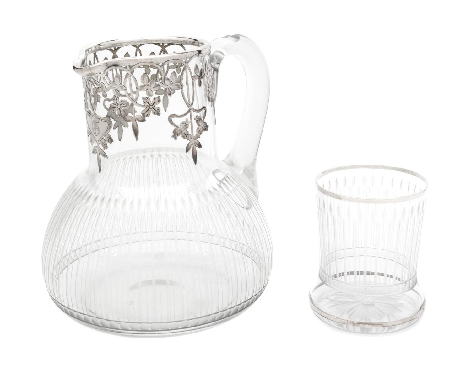 A Silver Overlay Glass Pitcher and Cup Height of pitcher 6 5/8 inches.