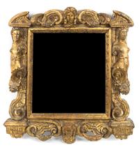A Continental Carved Giltwood Mirror Height 21 1/2 x width 20 inches.