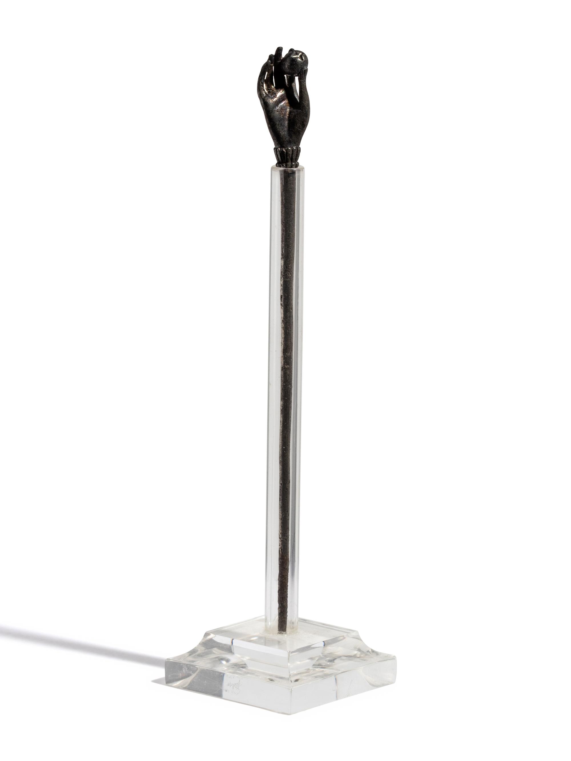 A Roman Silver Stickpin with a Hand and Pomegranate Finial