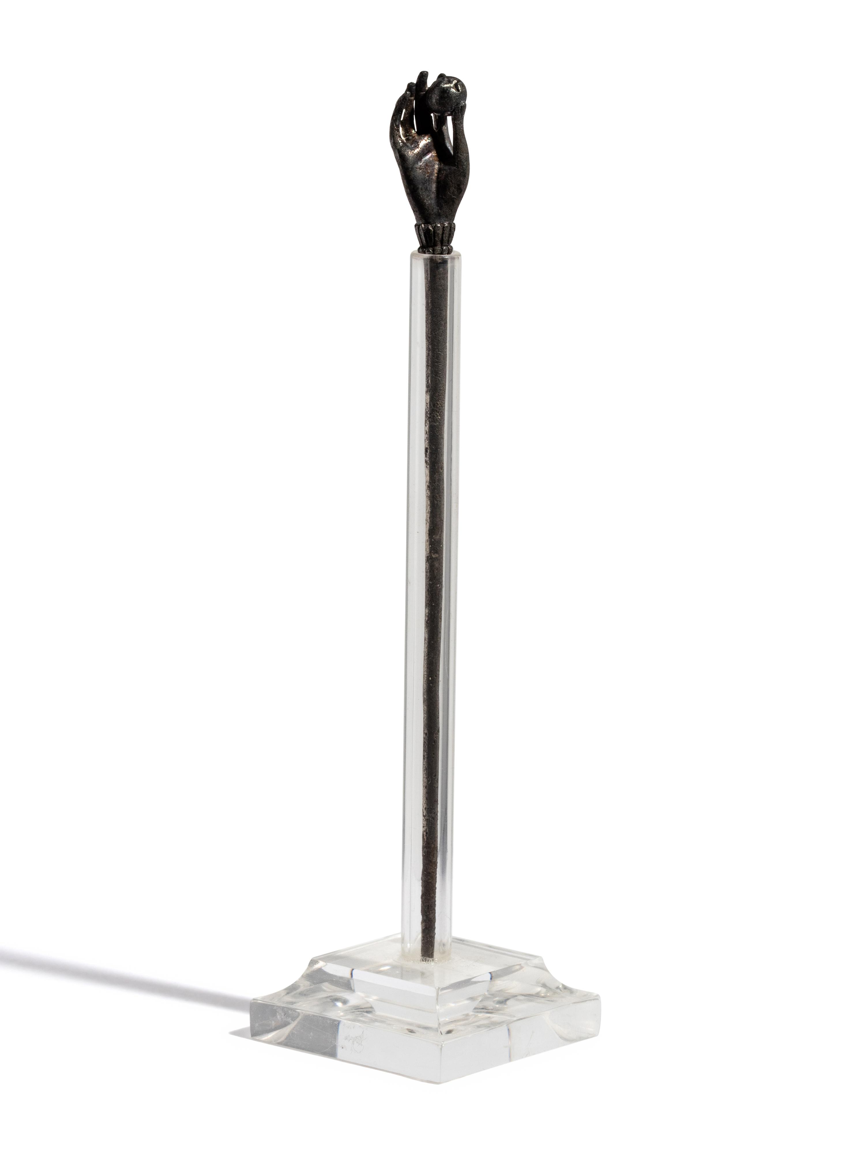A Roman Silver Stickpin with a Hand and Pomegranate Finial