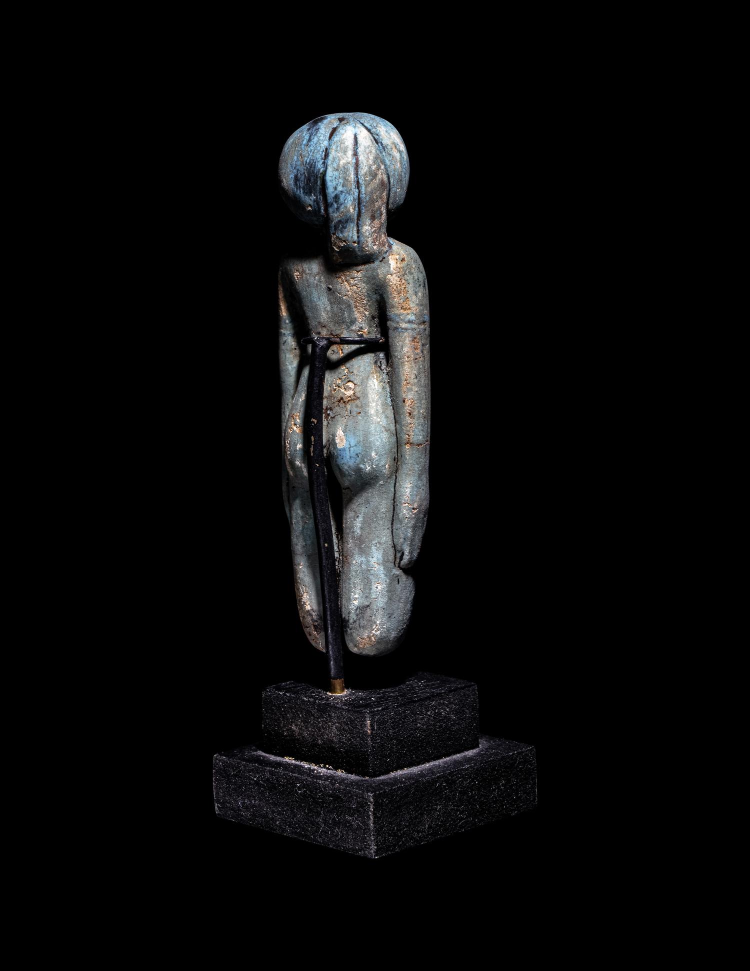 An Egyptian Faience Female Figure