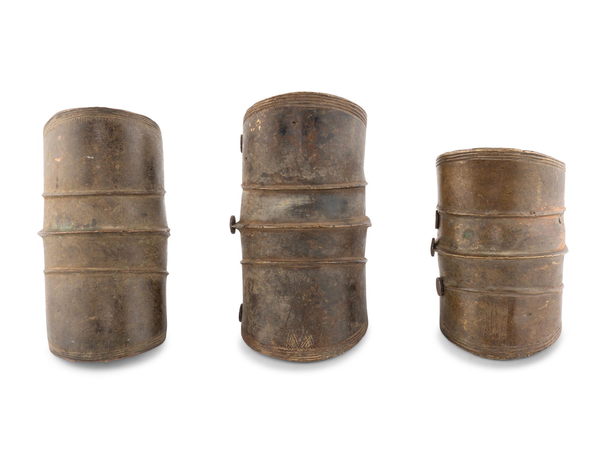 Three Bronze Cuffs