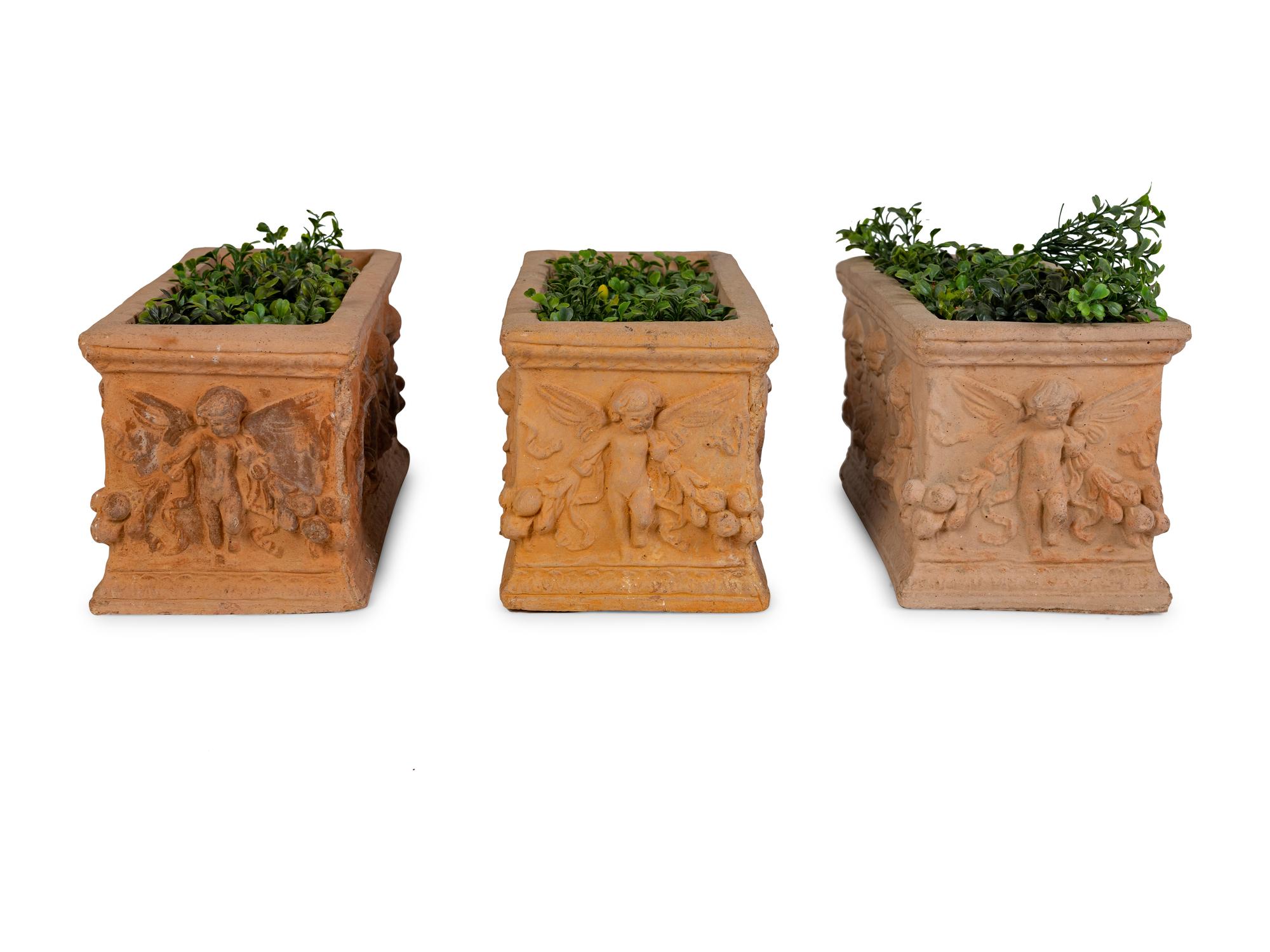 A Group of Three Terracotta Planters