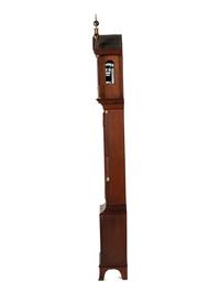 A Federal Carved and Inlaid, Brass-Mounted Mahogany Tall Case Clock