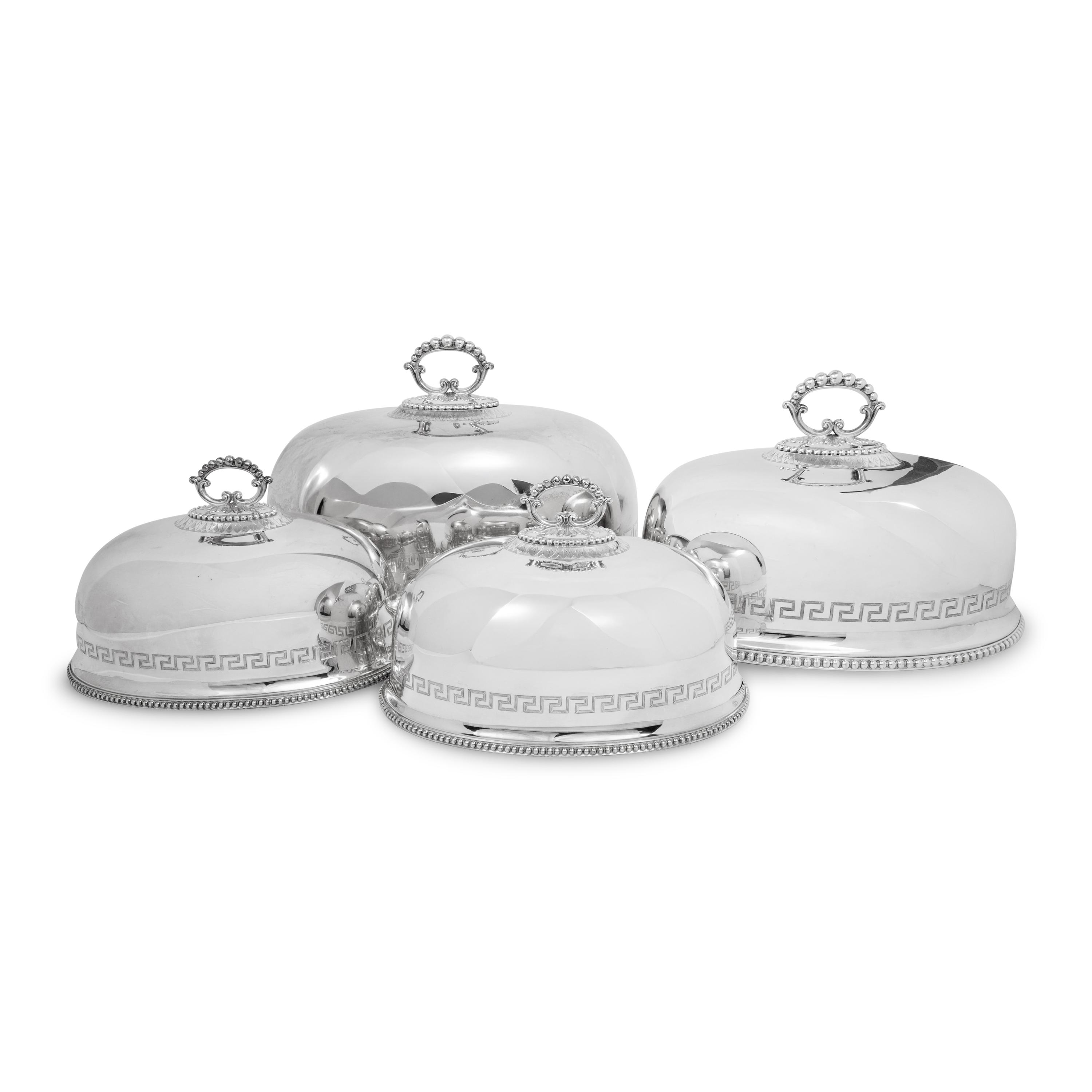 A Set of Four English Silver-Plate Cloches