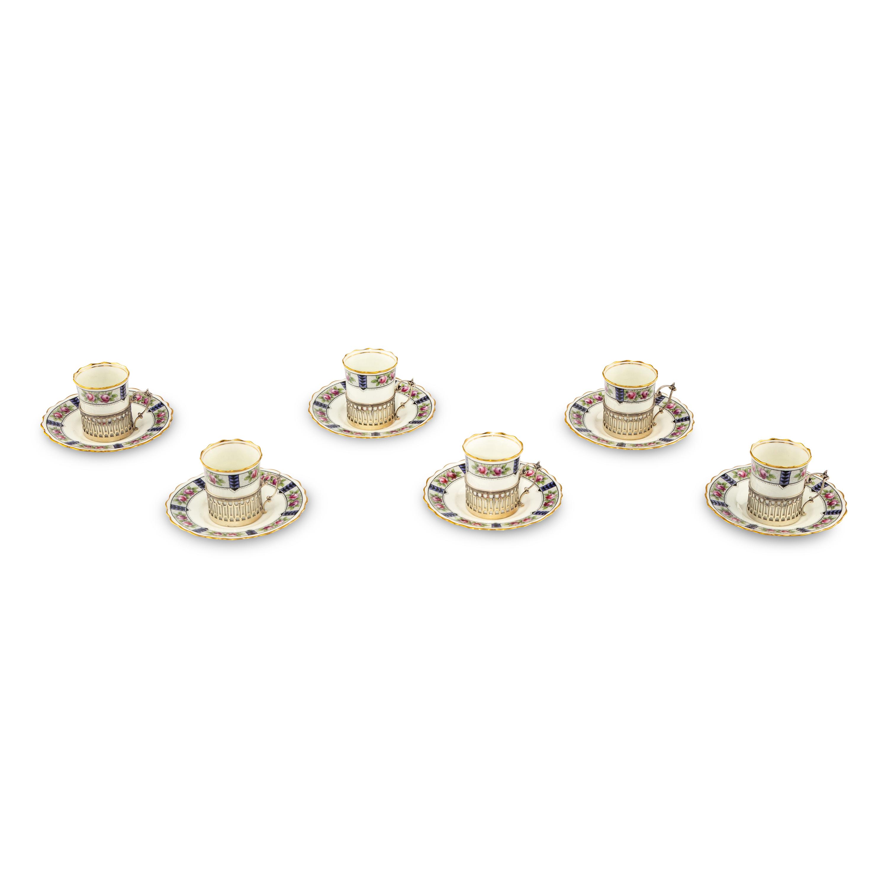 A Set of Six Aynsley Porcelain Coffee Cups and Saucers with Silver Liners
