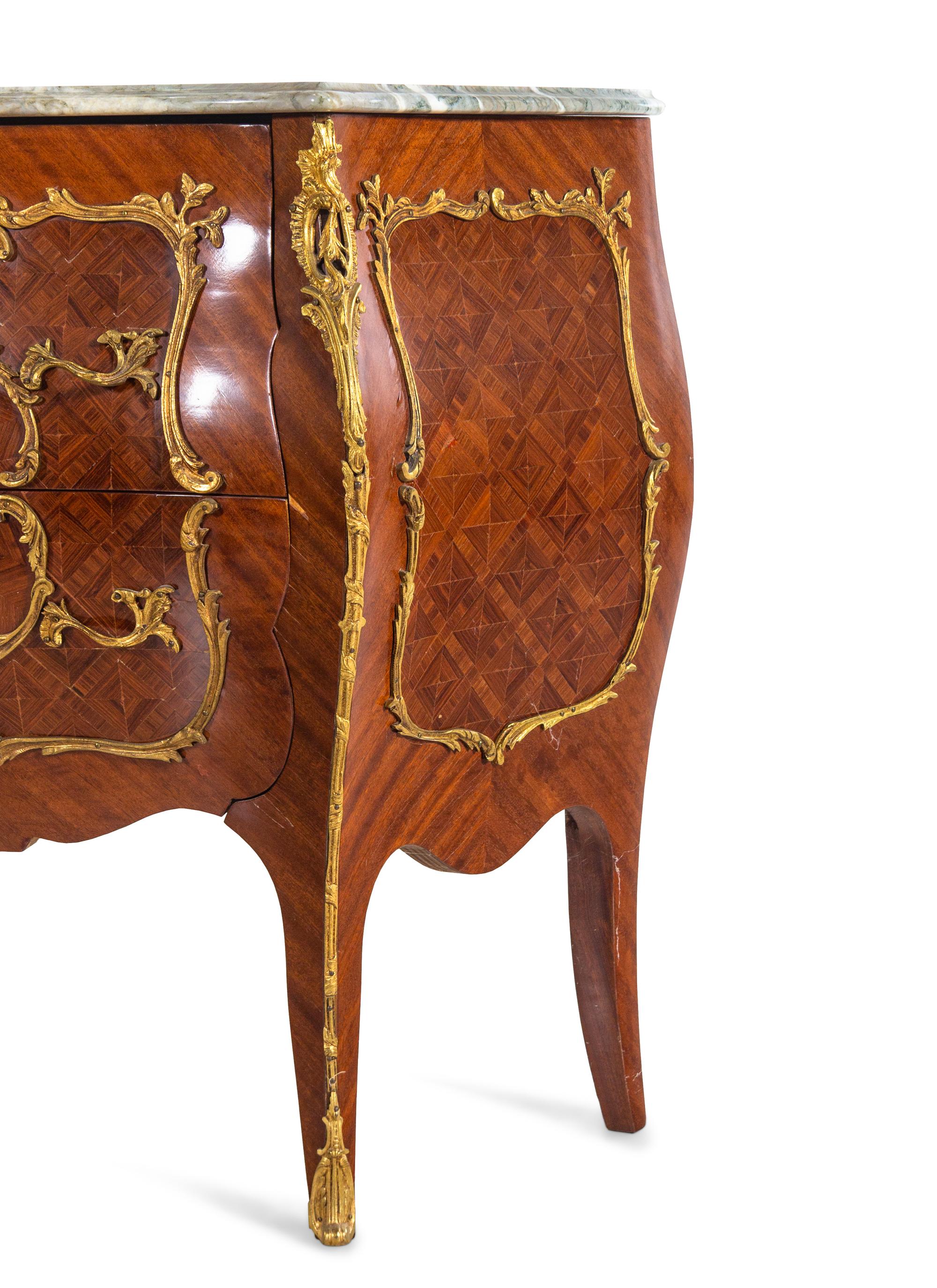A Pair of Louis XV Style Gilt Bronze Mounted Marble-Top Bombe Commodes
