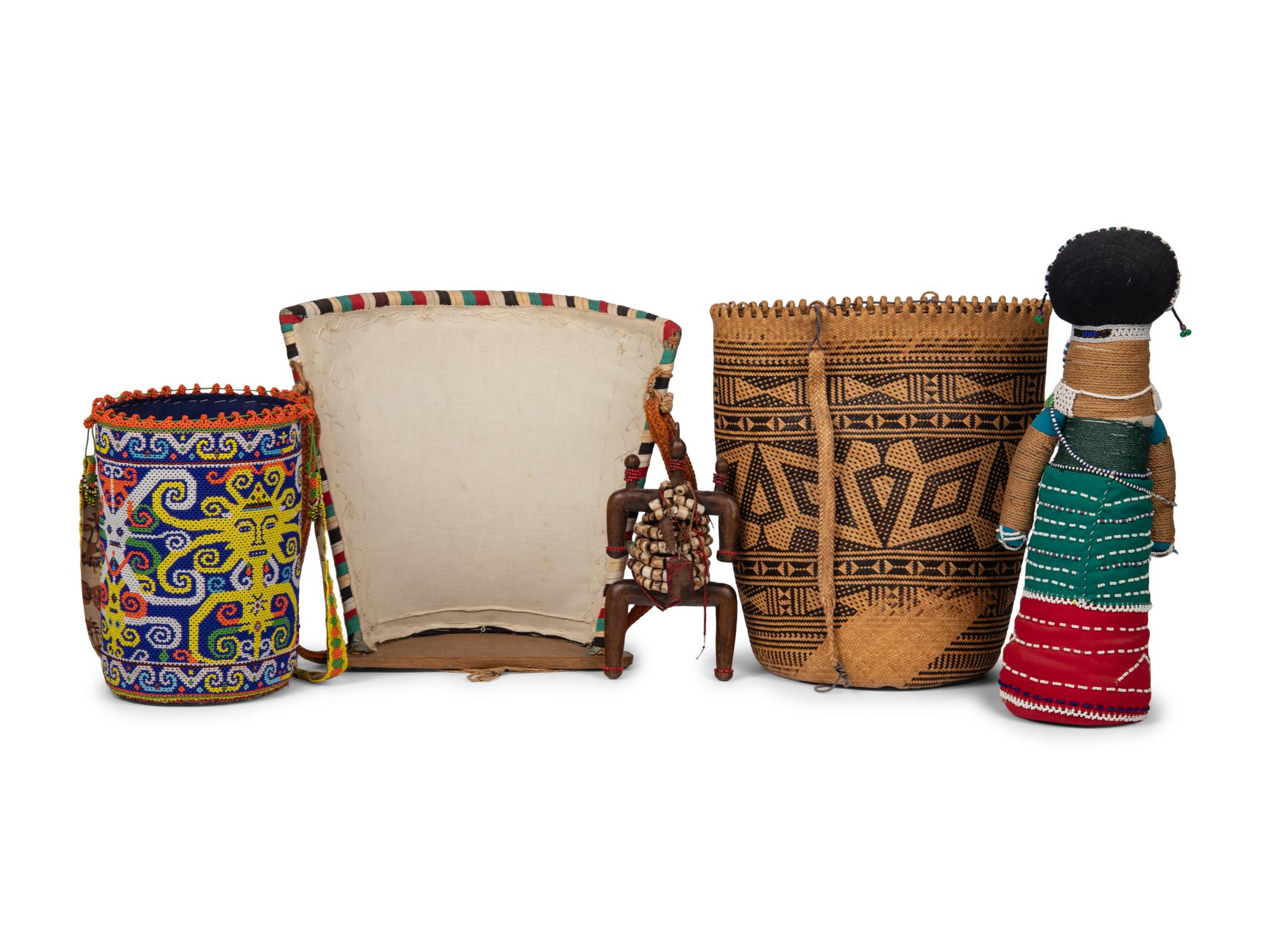A Ndebele Doll, Two Dayak Baskets and Baby Carrier, and a Carved and Beaded Namji Doll