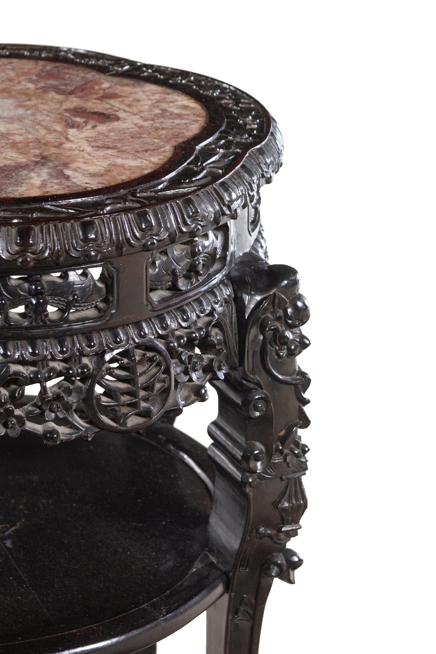 A Chinese Carved Hardwood and Marble-Inset Table