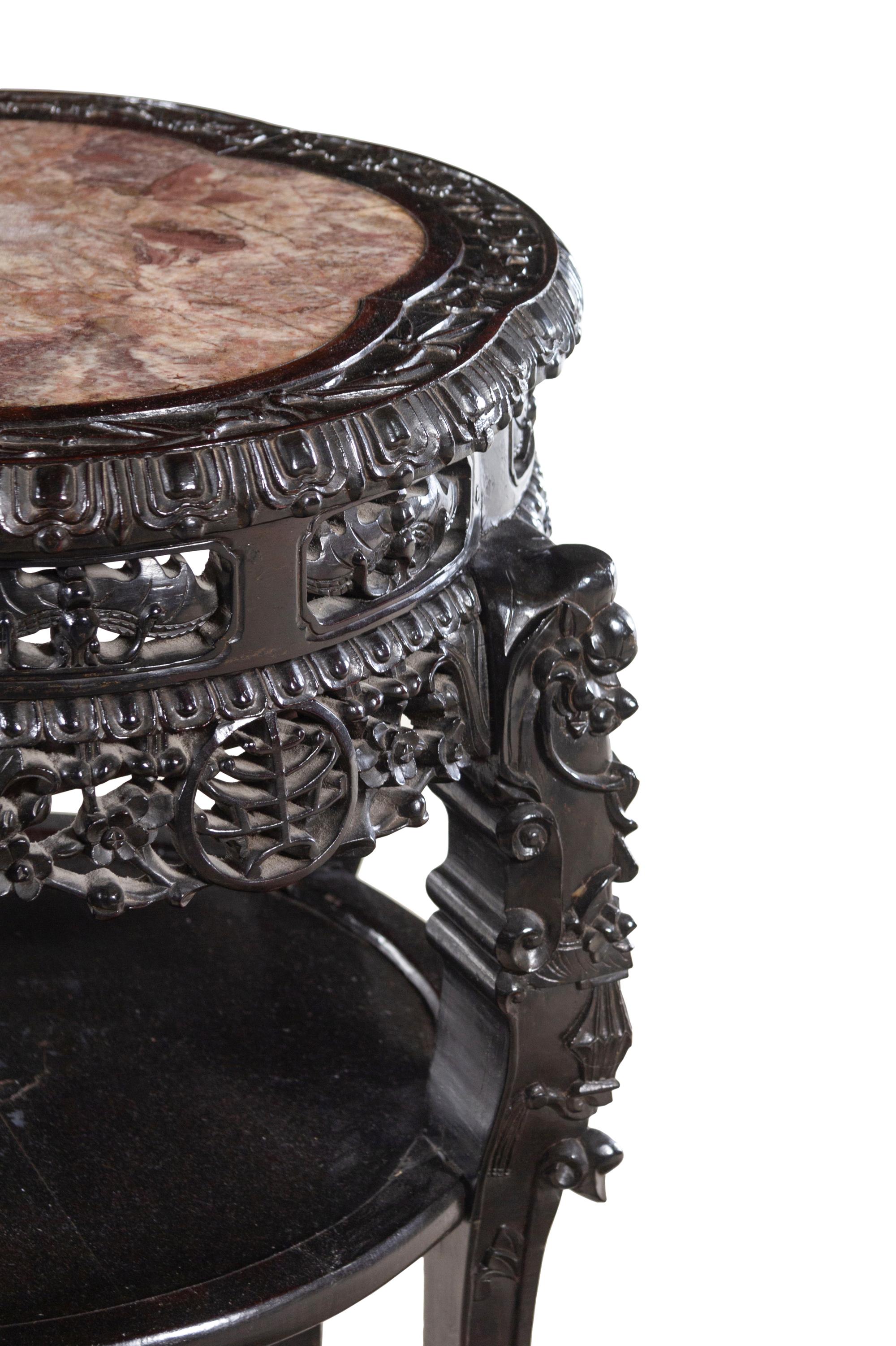 A Chinese Carved Hardwood and Marble-Inset Table