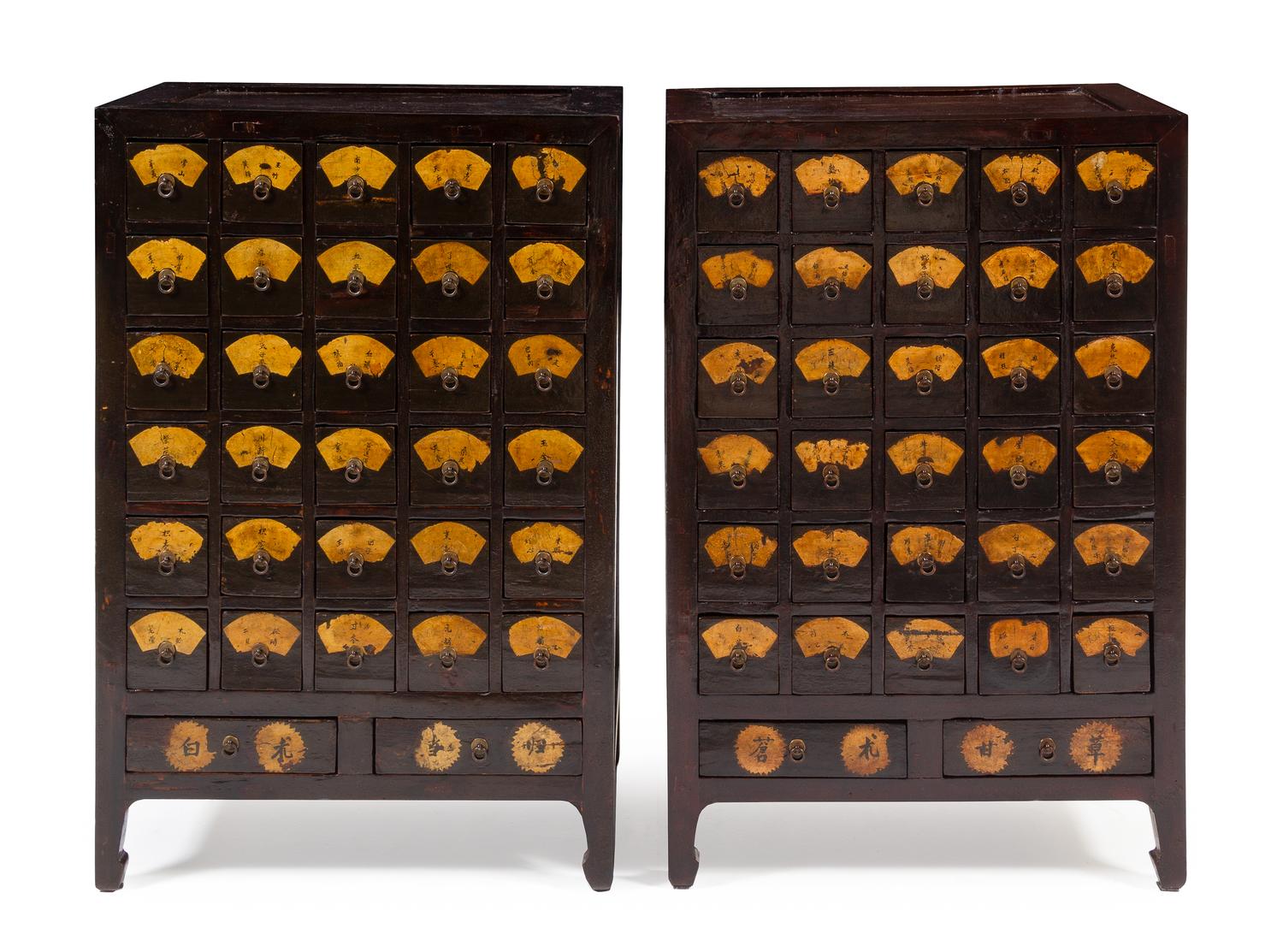 A Pair of Chinese Huanghuali Inset Elmwood Apothecary Cabinets, Yaogui Each height 43 x width 28 1/4 x depth 19 1/2 inches. — 19TH CENTURY