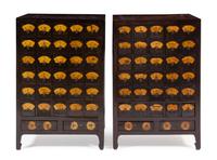 A Pair of Chinese Huanghuali Inset Elmwood Apothecary Cabinets, Yaogui Each height 43 x width 28 1/4 x depth 19 1/2 inches. — 19TH CENTURY