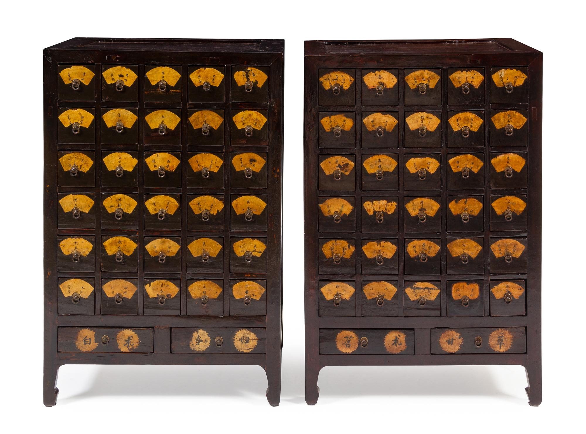 A Pair of Chinese Huanghuali Inset Elmwood Apothecary Cabinets, Yaogui Each height 43 x width 28 1/4 x depth 19 1/2 inches. — 19TH CENTURY