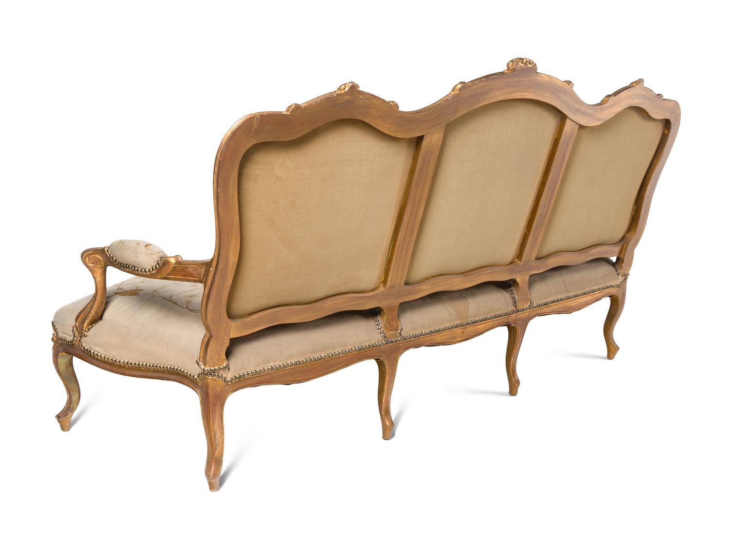 A Louis XV Style Giltwood Seven-Piece Salon Suite