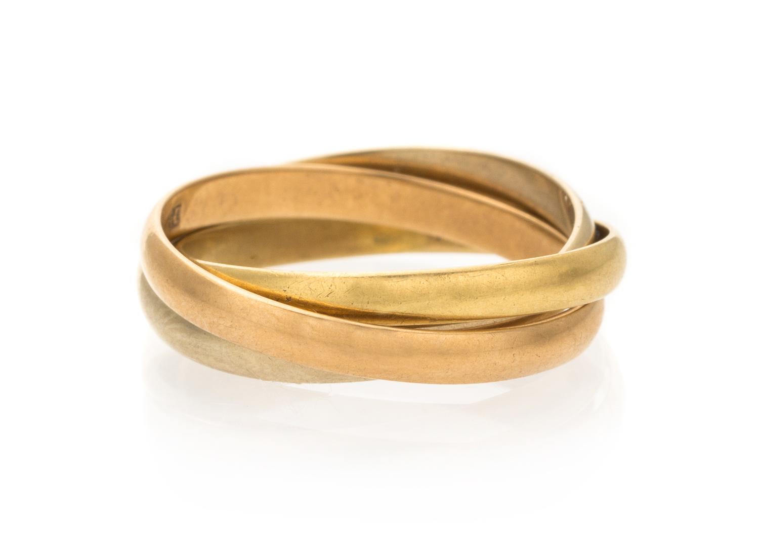 An 18 Karat Tricolor Trinity Ring, Cartier, 3.00 dwts.