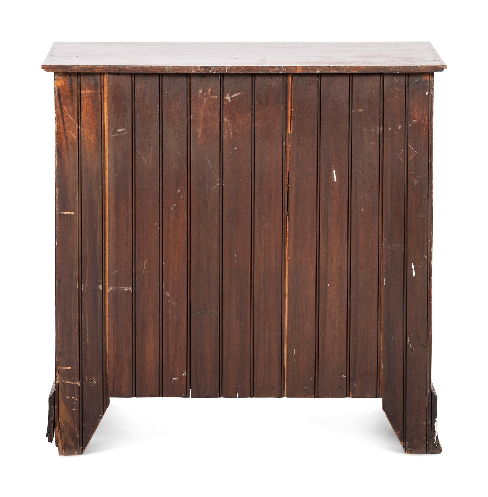 A Federal Style Inlaid Mahogany Chest of Drawers