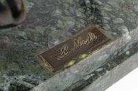 A Continental Bronze Model of a Horse on a Marble Base