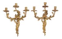 A Pair of Louis XV Style Gilt Bronze Three Light Wall Sconces Height 16 3/4 inches. — 20TH CENTURY