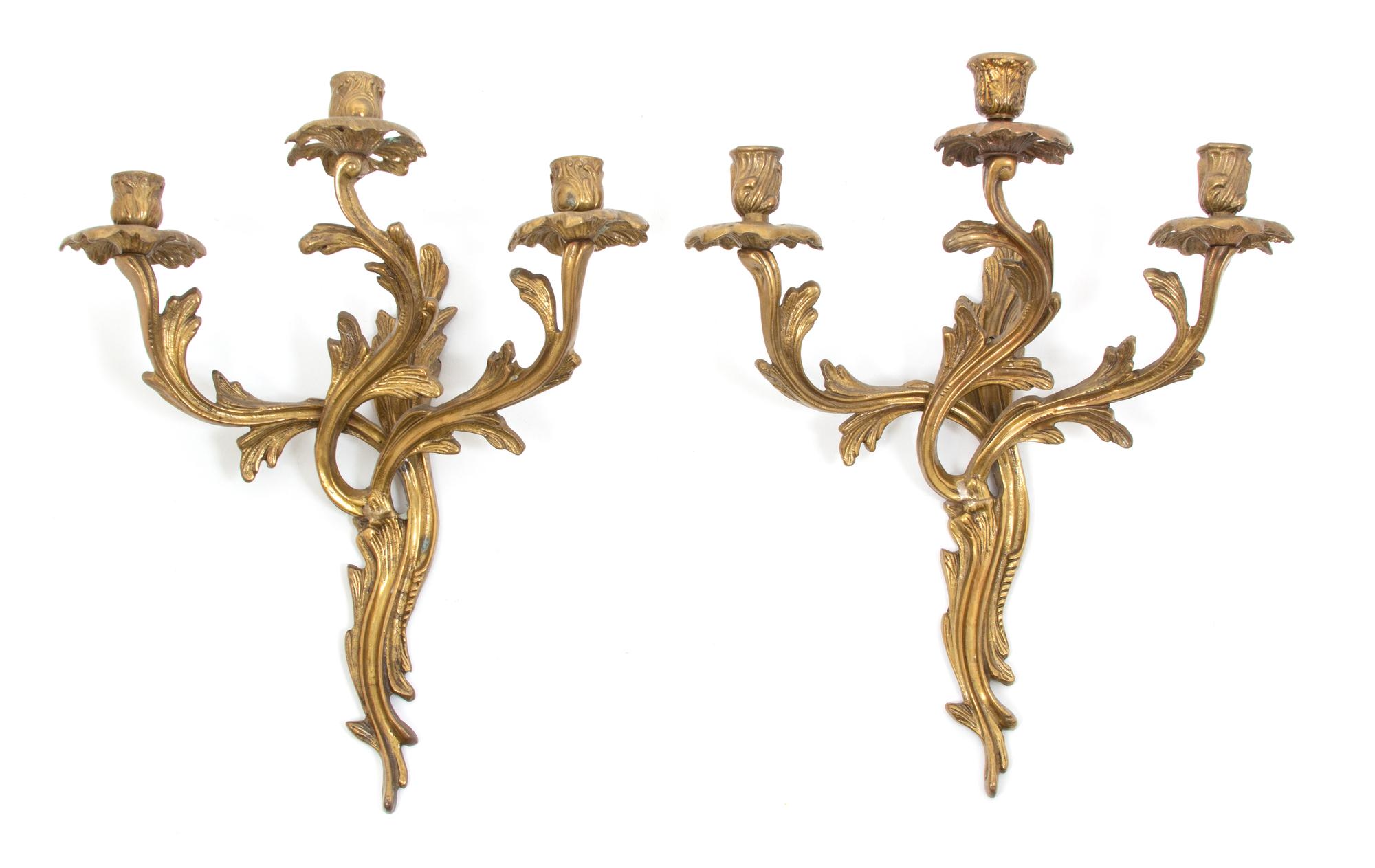 A Pair of Louis XV Style Gilt Bronze Three Light Wall Sconces Height 16 3/4 inches. — 20TH CENTURY