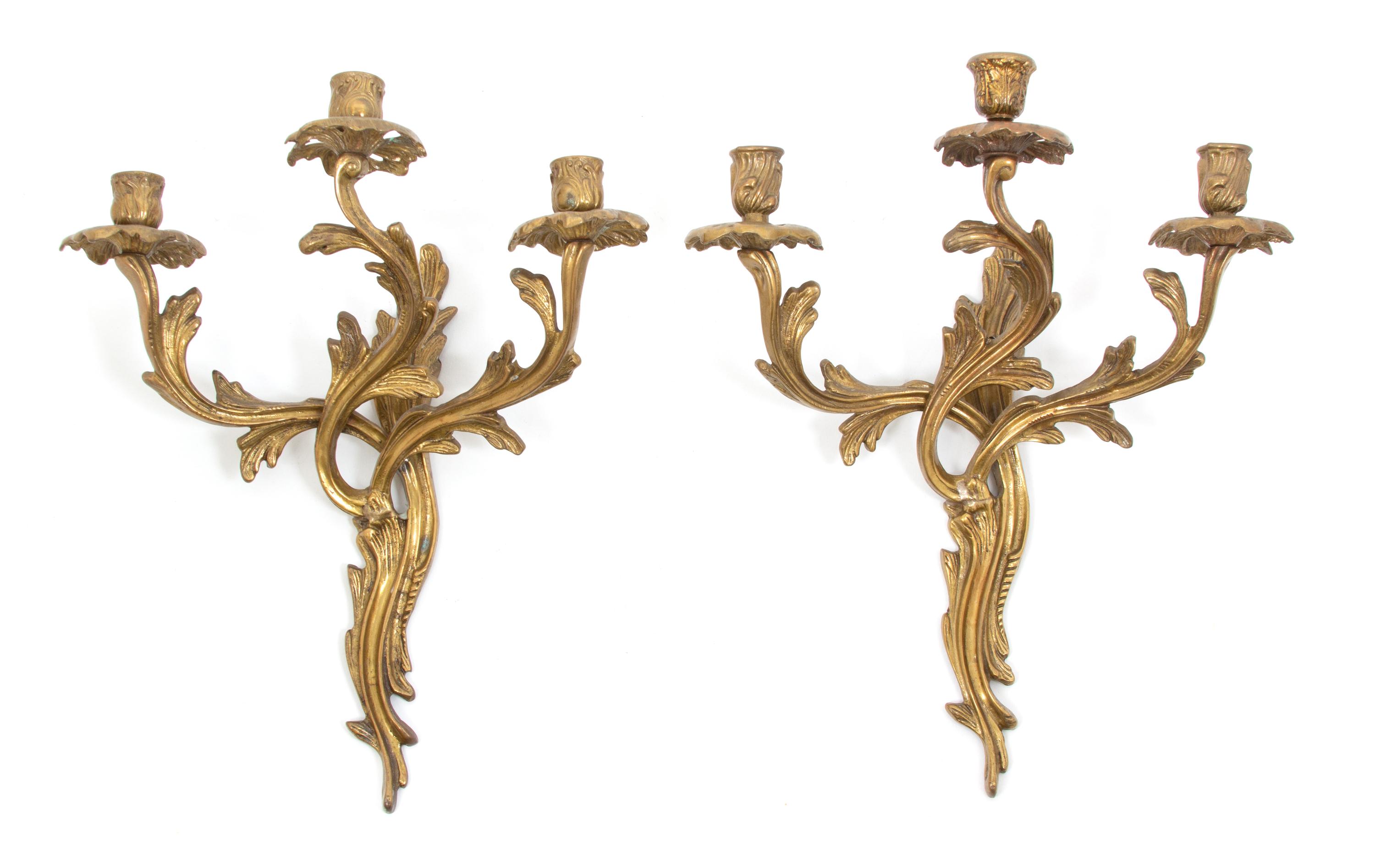 A Pair of Louis XV Style Gilt Bronze Three Light Wall Sconces Height 16 3/4 inches. — 20TH CENTURY