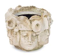 A Cast Concrete Jardinière with Faces in Relief
