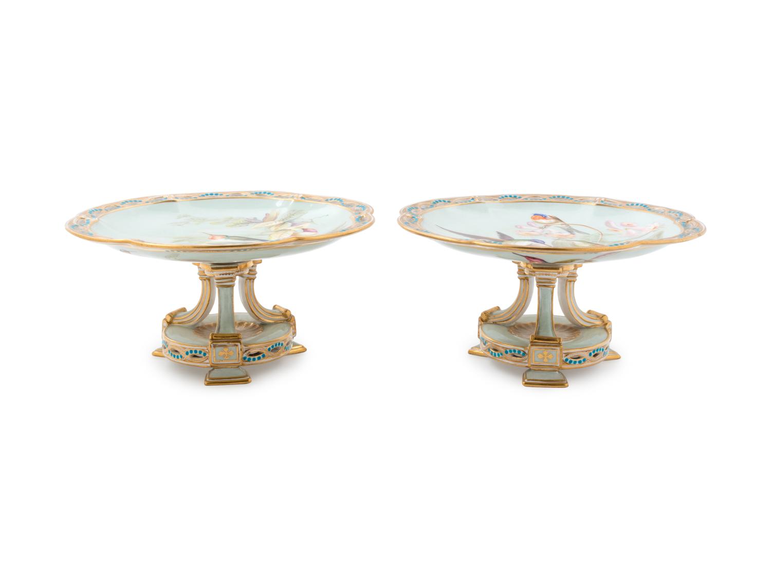 A Pair of Continental Ornithological Painted and Parcel Gilt Porcelain Compotes