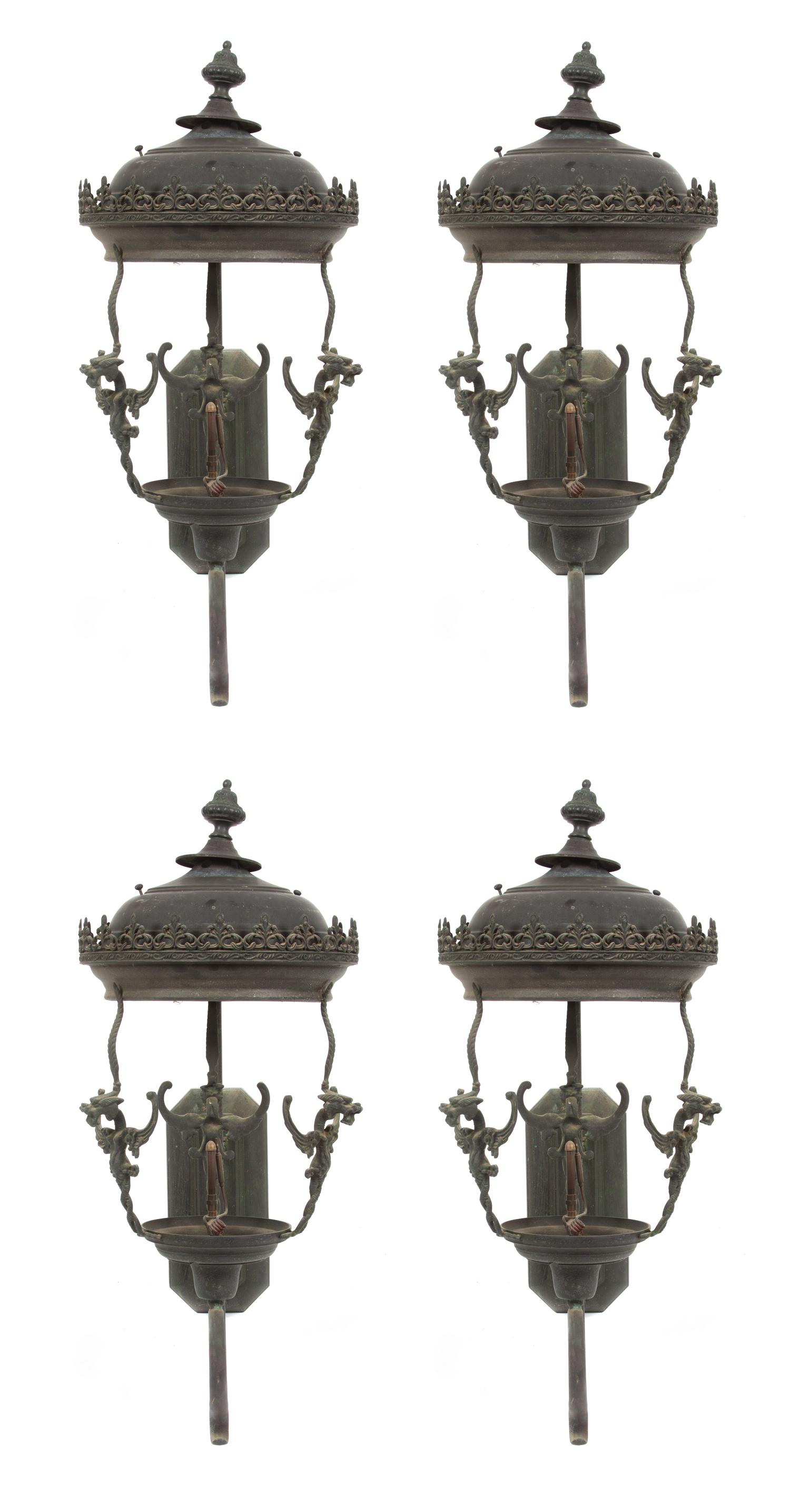 A Group of Four Cast Metal Wall-Mounted Lanterns Height 32 inches. — 19TH/20TH CENTURY