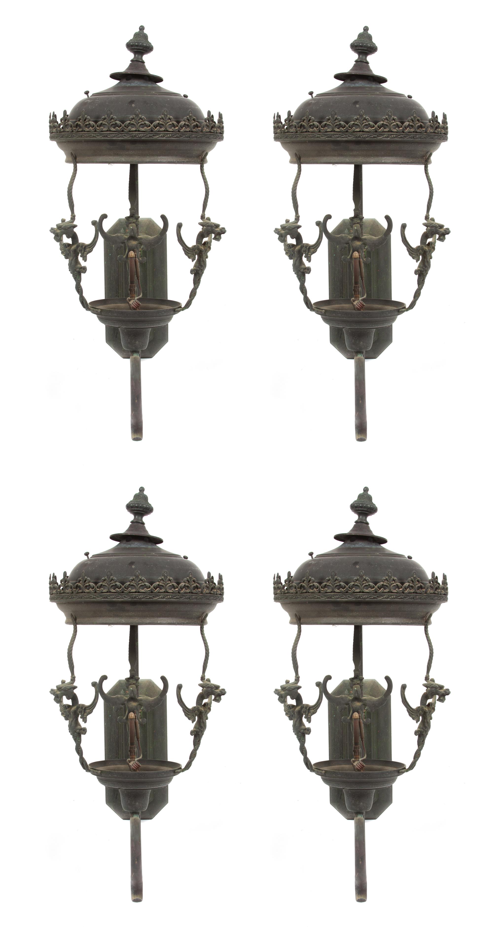 A Group of Four Cast Metal Wall-Mounted Lanterns Height 32 inches. — 19TH/20TH CENTURY