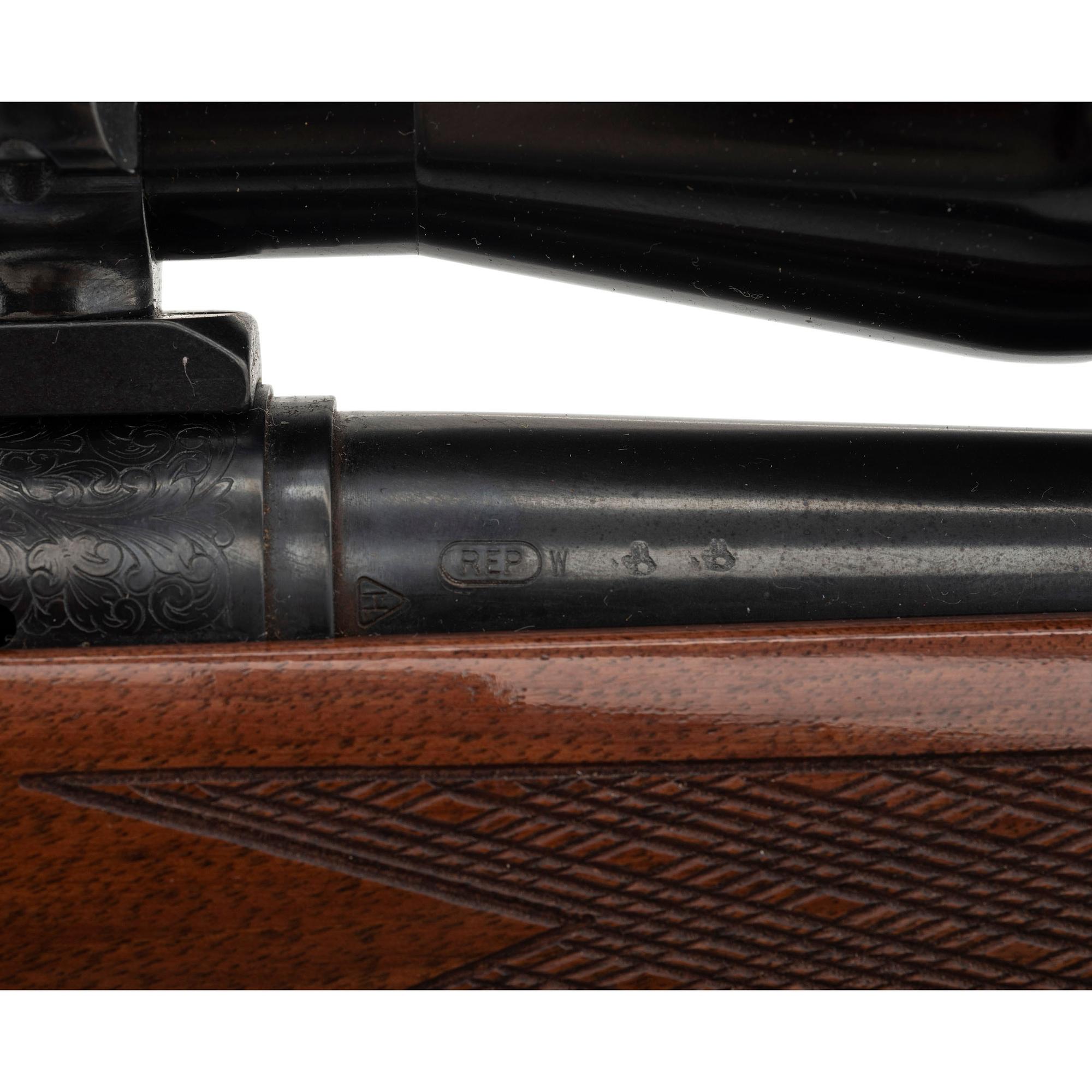 * Remington Model 700 Rifle with Burris Scope and Engraved Receiver