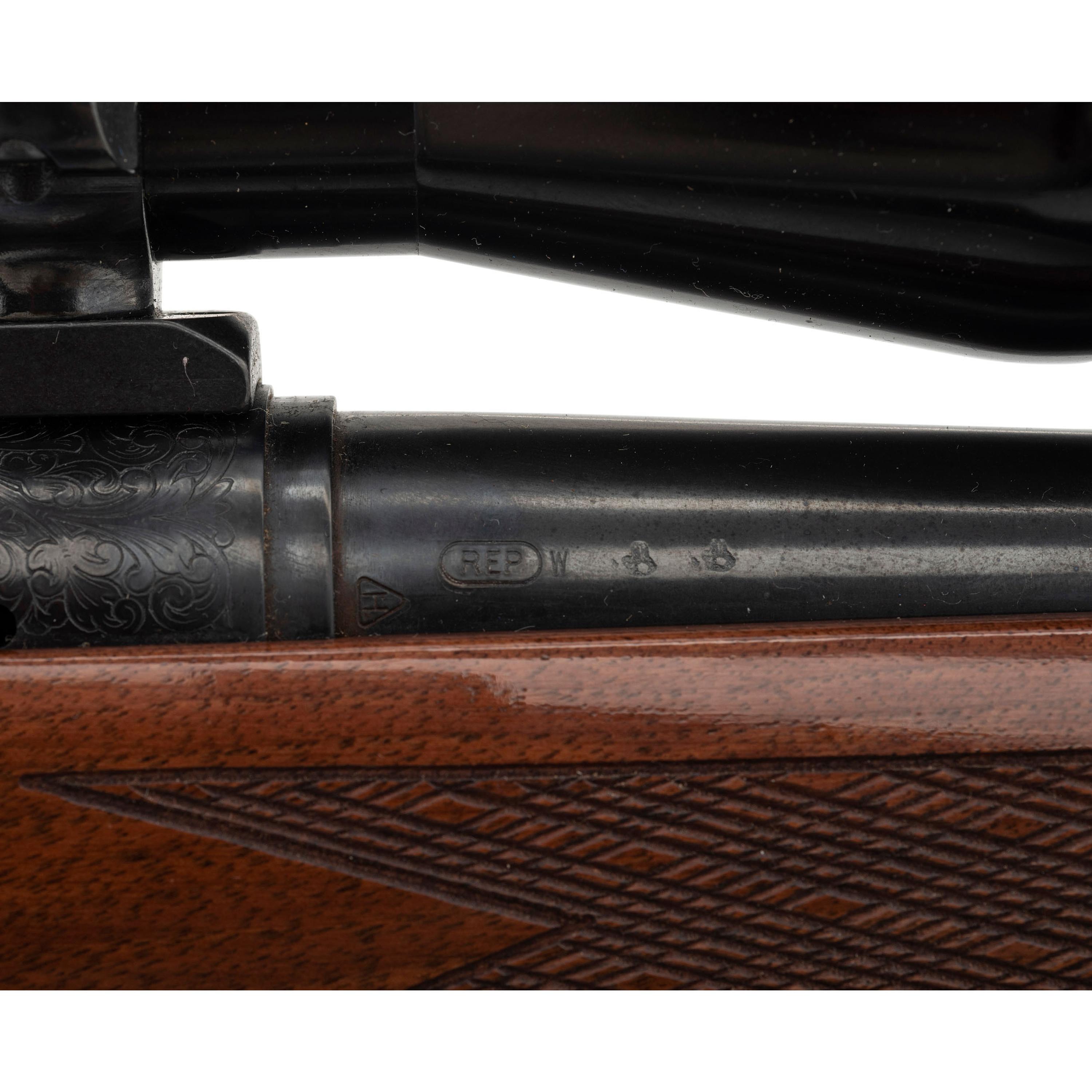 * Remington Model 700 Rifle with Burris Scope and Engraved Receiver