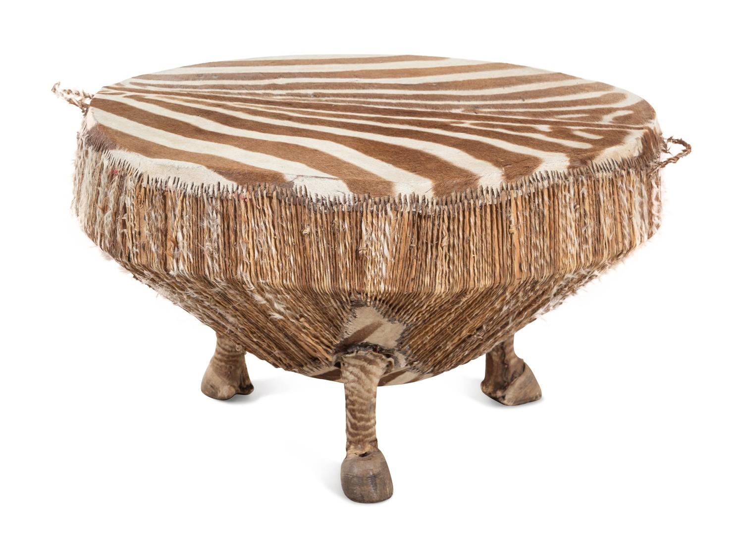 A Taxidermy Zebra Hide and Zebra Leg Table