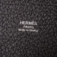 A Hermes Black Taurillon Clemence Picotin MM Handbag, 9" x 8.5" x 7".