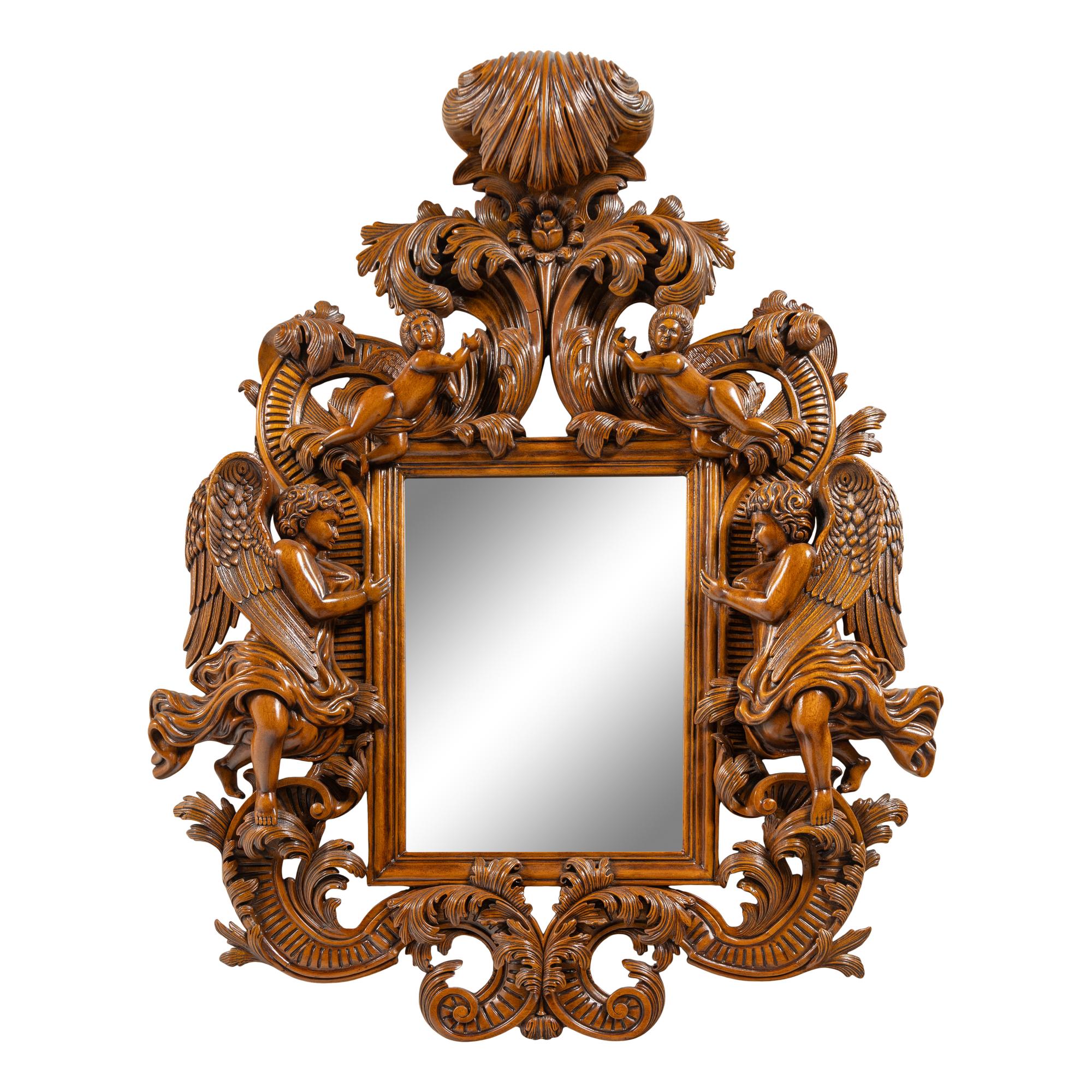 An Italian Baroque Style Carved Walnut Mirror