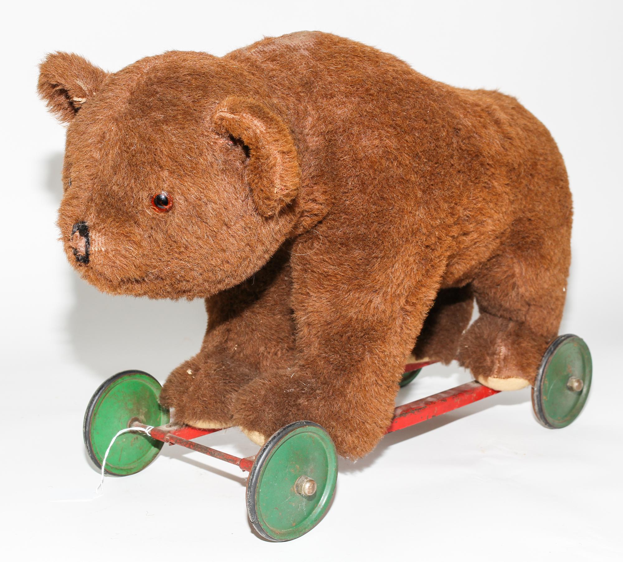A Stuffed Pull Toy, possibly Steiff Length of first 24 inches. — EARLY 20TH CENTURY