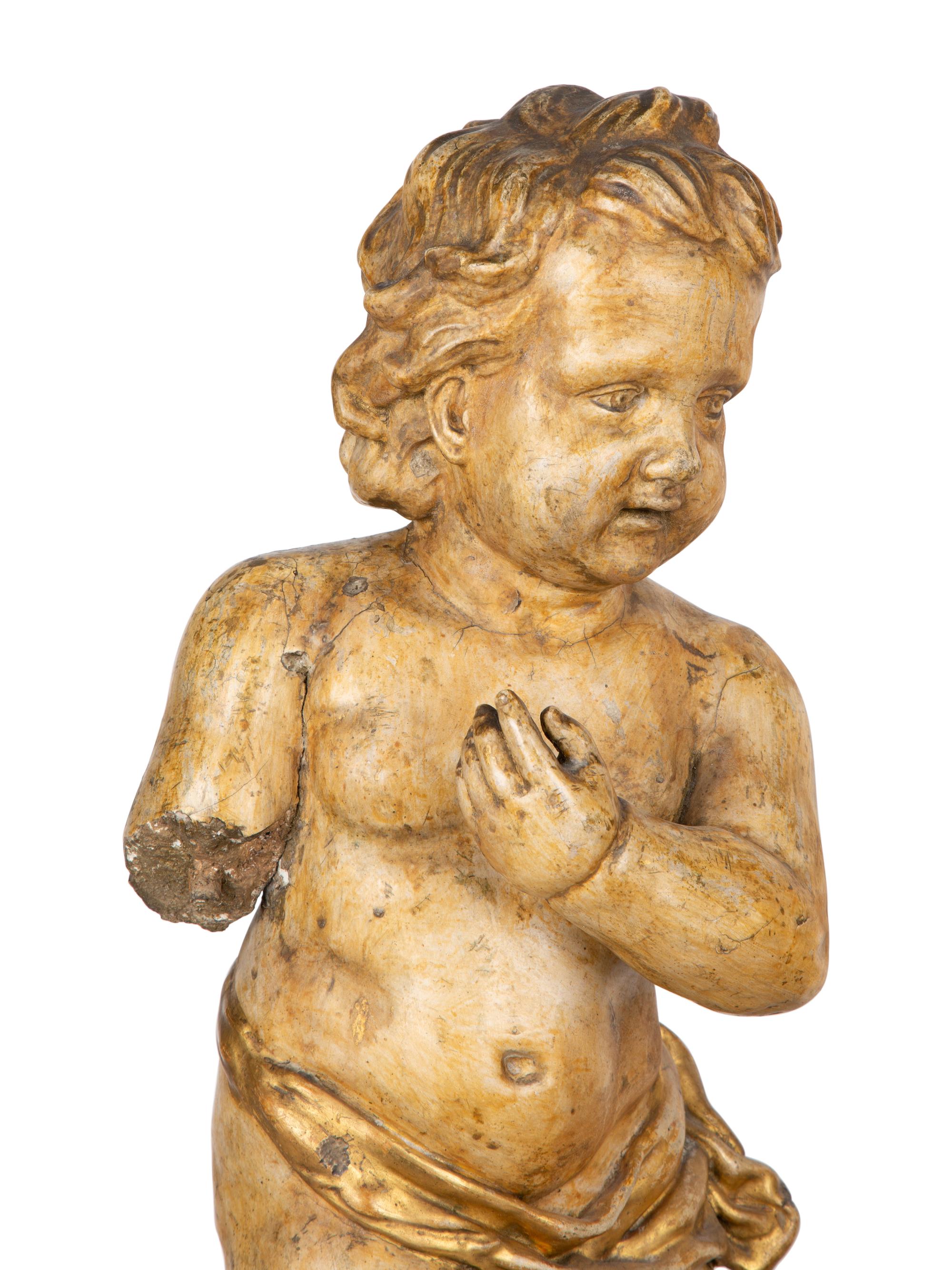 A Pair of Italian Carved and Parcel Gilt Cherubs — 19TH CENTURY