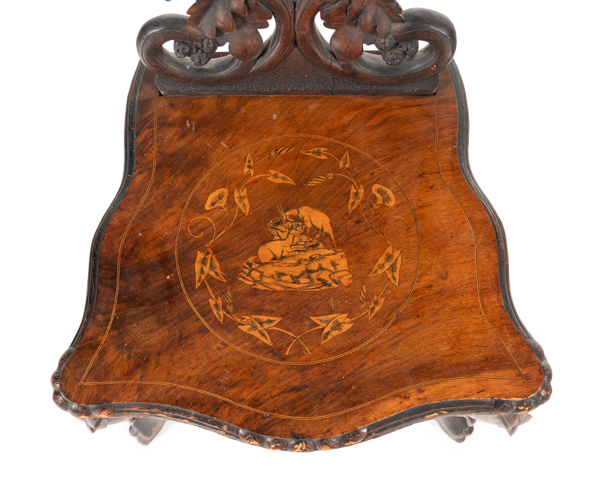 A Black Forest Carved Musical Chair