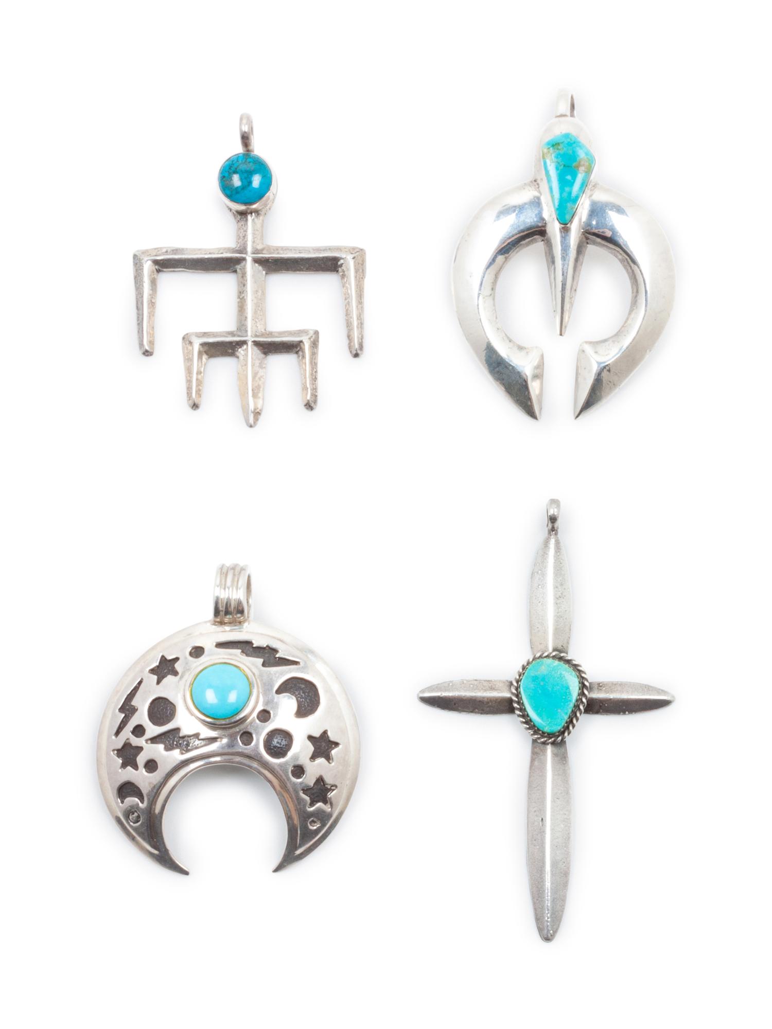 Four Southwestern Sterling Silver and Turquoise Pendants