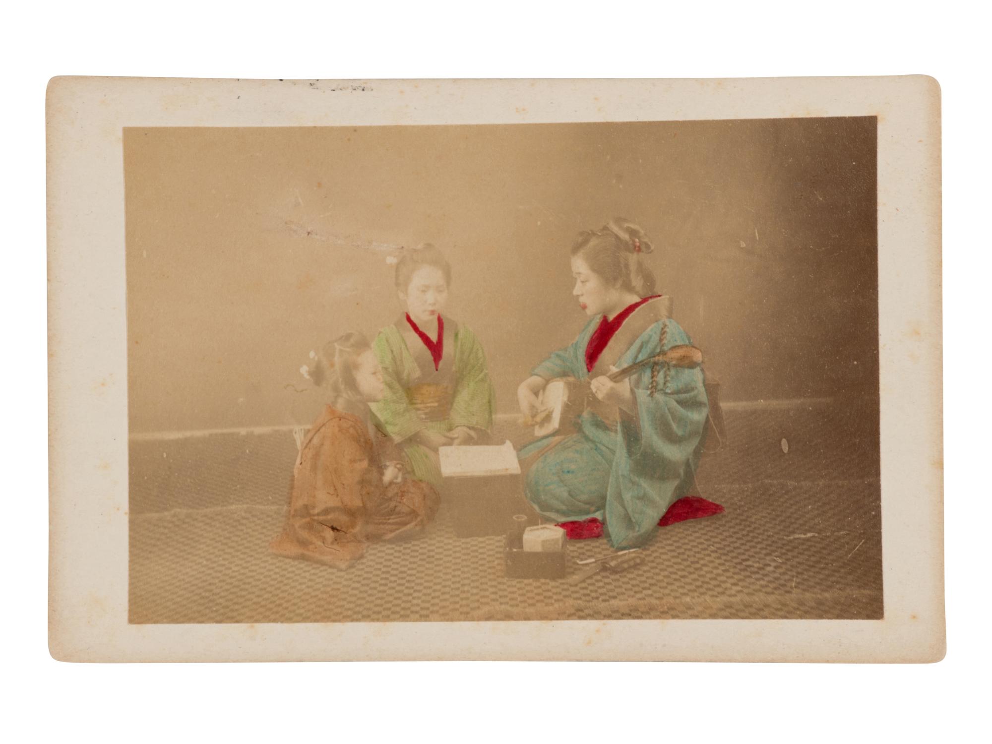 Four Japanese Hand Tinted Photographs
